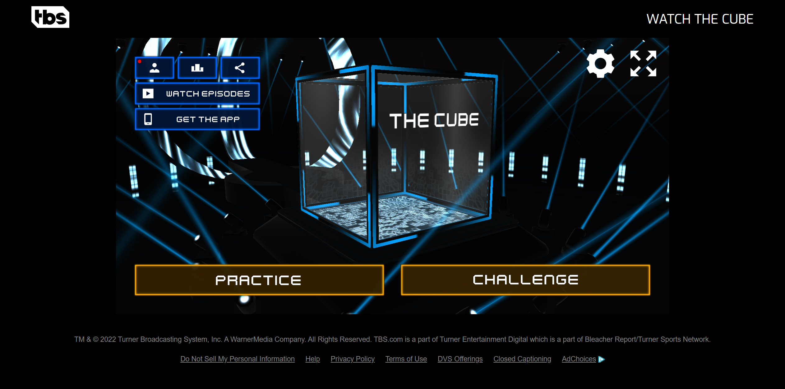 Screenshot of The Cube web game main menu. A blue cube rotates in the middle of a dark stage, surrounded by sharp blue laser lights.